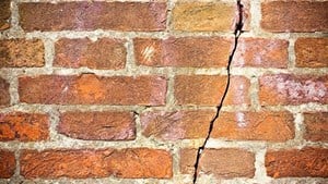 Brick wall with large crack