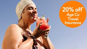 20% off Age Co Travel Insurance lady sipping coctail 16_9