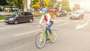 Cyclist with helmet on London road