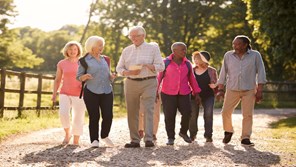 Group of senior people standing in a row